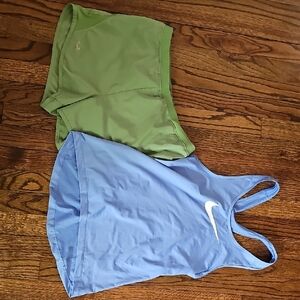Nike Light Blue Tank and Apple Green Underamour Shorts.
